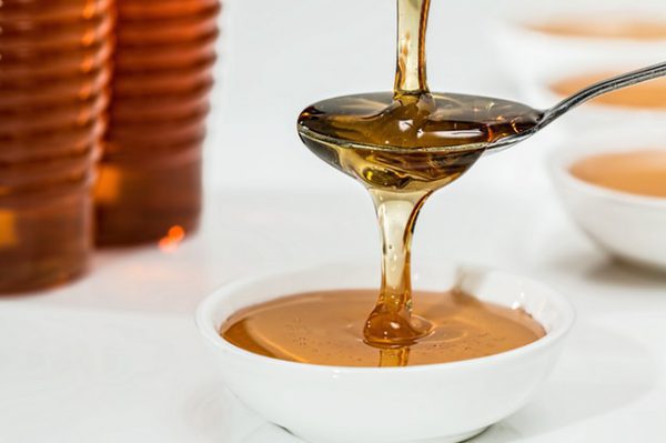 Close up of pouring honey