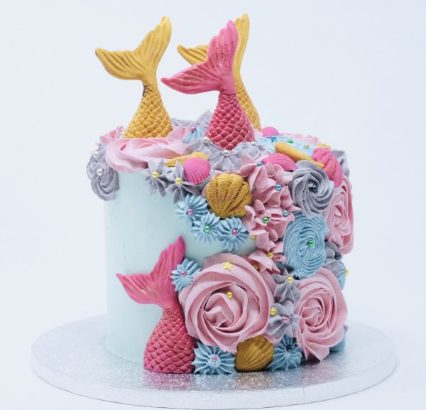 Vibrant rainbow gourmet mermaid childrens celebration cake