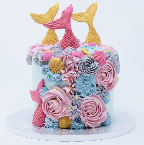 Colourful rainbow mermaid childrens celebration cake