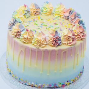Unique luxury colourful rainbow birthday drip cake