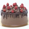 Luxury handcrafted chocolate ganache drip cake topped with strawberries