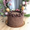 Indulgent handcrafted artisan chocolate cake with chocolate ganache