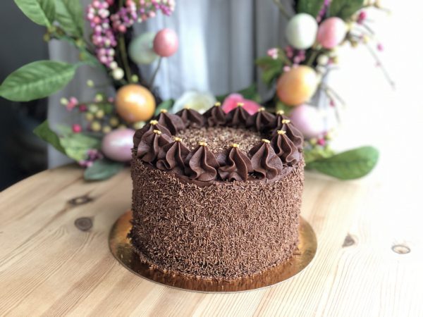 Indulgent handcrafted artisan chocolate cake with chocolate ganache