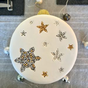 Handcrafted, decorated gourmet Christmas fruit cake