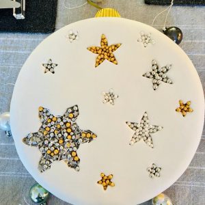 Classic gourmet Christmas cake with snowflakes and stars