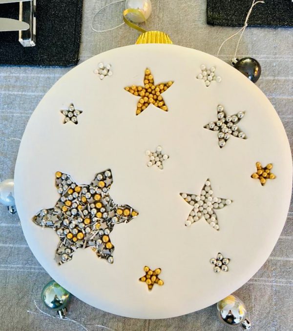 Classic gourmet Christmas cake with snowflakes and stars