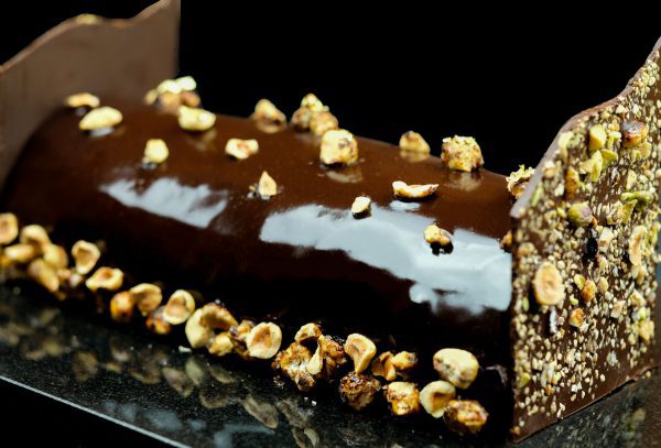 Gourmet Christmas chocolate log with nuts