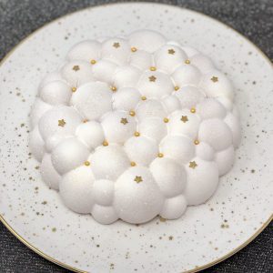 Unique, handcrafted Christmas cloud cake decorated with gold stars