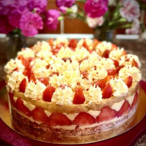 Freshly baked Fraisier classic French cake with cream and fresh strawberries