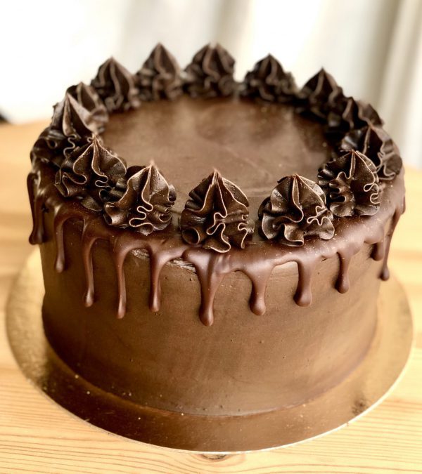 Indulgent handmade dark chocolate celebration cake