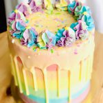 Beautiful rainbow childrens birthday pinata cake