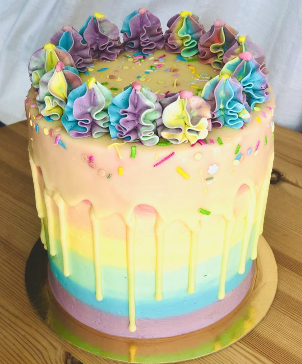 Handmade colourful rainbow pinate birthday cake