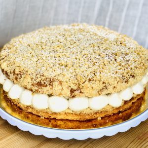 Handcrafted Tarte Tropezienne with cream filling and almond and sugar crumble