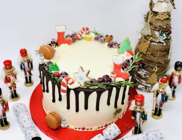 Beautiful Christmas dessert, festive cake with decorations