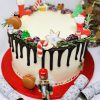 Festive Christmas cake handcrafted with christmas decorations