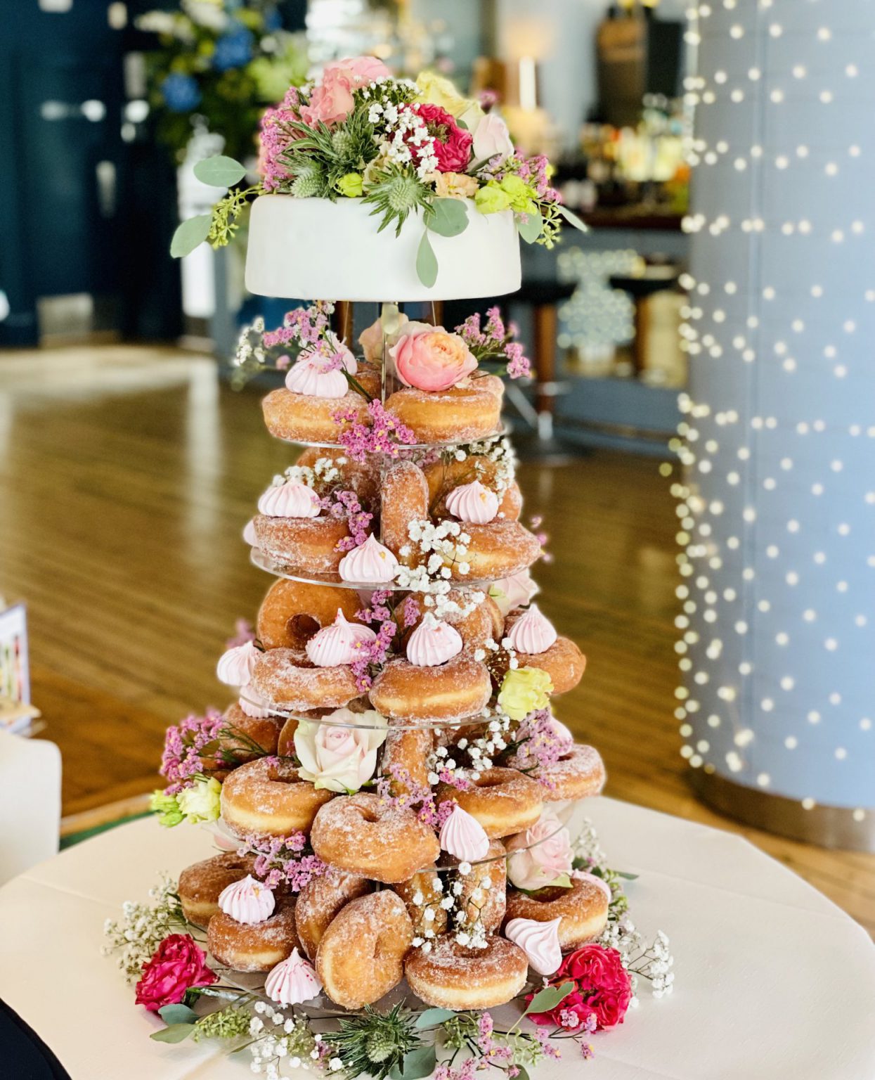 Wedding cake and doughnut tower 7Marvels Cakes & Macarons